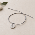 Love bracelet, front view with Amar Nat symbol engraving